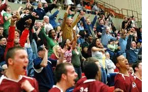 students cheering at a sport event